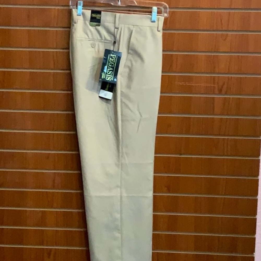 New with tags. Tan dress slacks.
